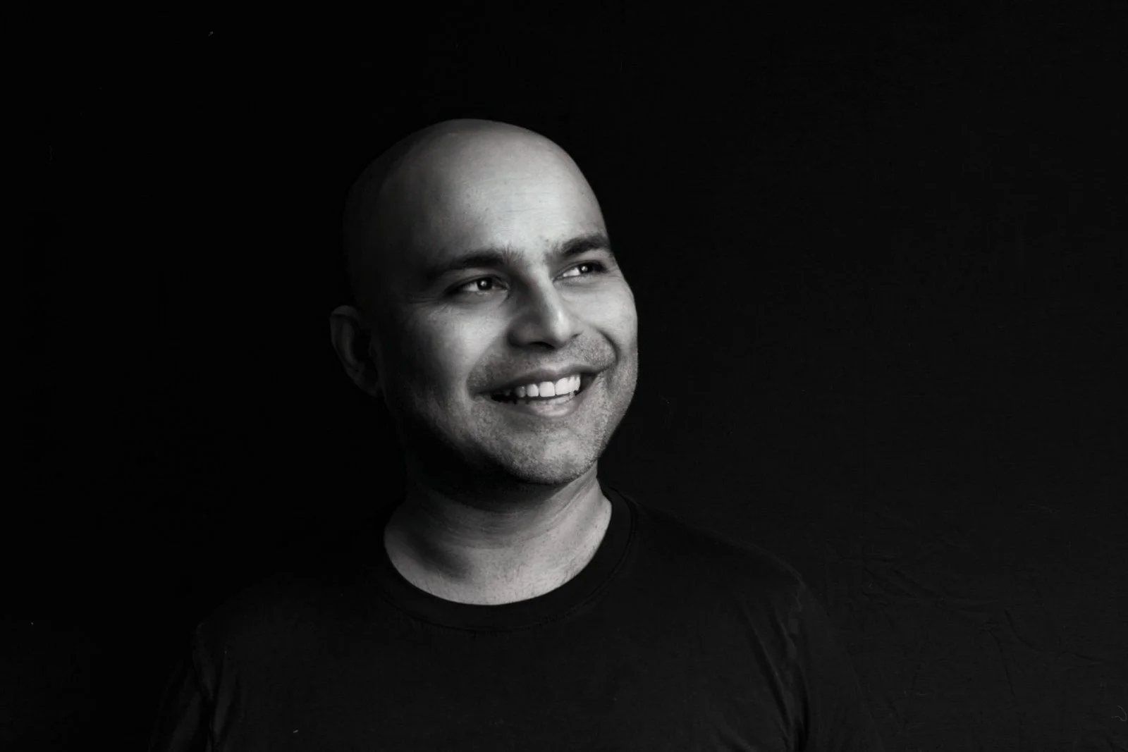 Raj Bandyopadhyay working with a client in his photography studio