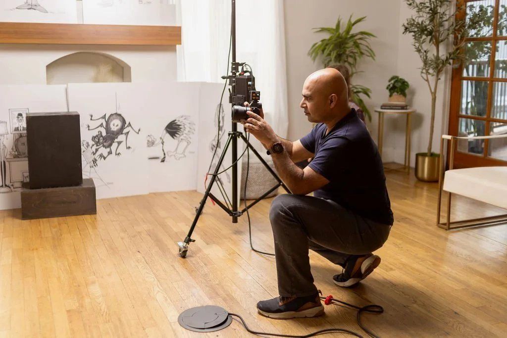 Raj Bandyopadhyay setting up a shot during a personal branding session