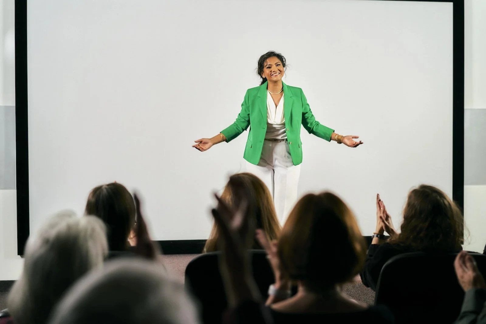 Speaker photographed on stage for a personal brand media kit, New York City.
